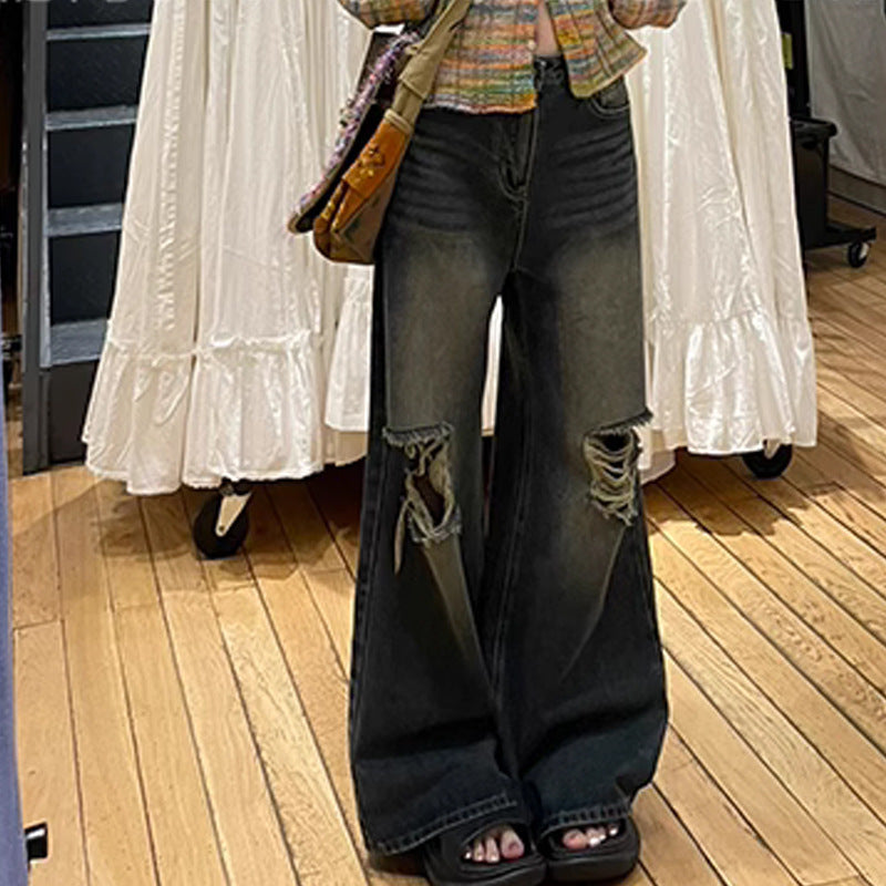 Retro washed ripped black straight-leg jeans for women with distressed details and micro elasticity