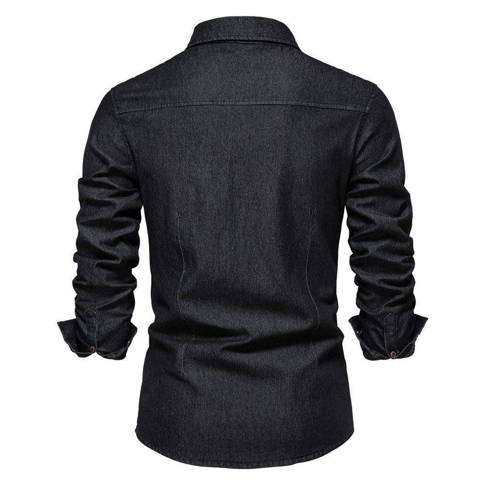 Back view of men's long-sleeved slim fit black denim shirt with buttoned cuffs