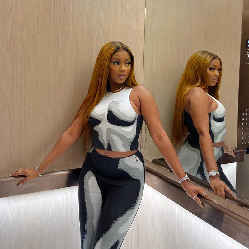 Women's Fashion Collision Color Sleeveless Leaky Umbilical Top High Waist Package Hip Pants Set