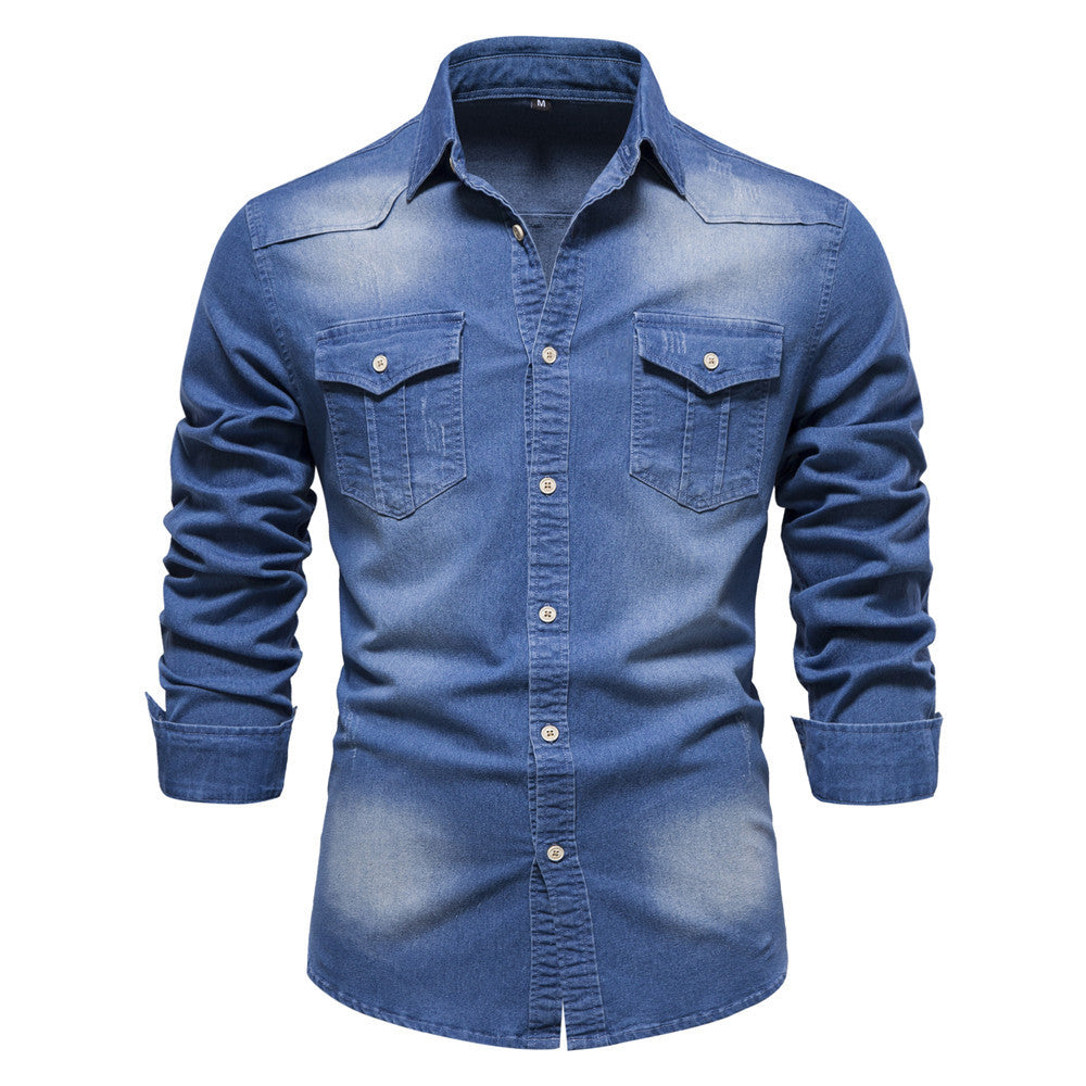 Men's long-sleeved denim shirt with slim fit, button front, and chest pockets in solid blue cotton fabric